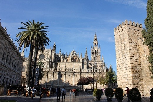 This Seville Cathedral is also known as The Cathedral of Saint Mary of the See. It is a must-to-see when visiting the capital city of the Andalusian region in Spain. It is located near the Alcazar Palace complex and together with the Cathedral, they are listed in the UNESCO World Heritage Site since 1987.

You have to put in mind that it is the largest Gothic Cathedral in the world. After St. Peter's in Rome and St.  Paul's in London, It is also the third largest church in the world. If you have the chance to go inside, do it  because its interior is really amazing. You can also find the remains of Christopher Columbus inside the Cathedral.