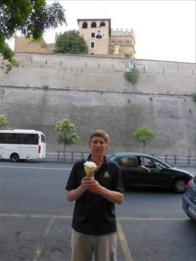 Ian in front of the Vatican wall with an exceptional gelato