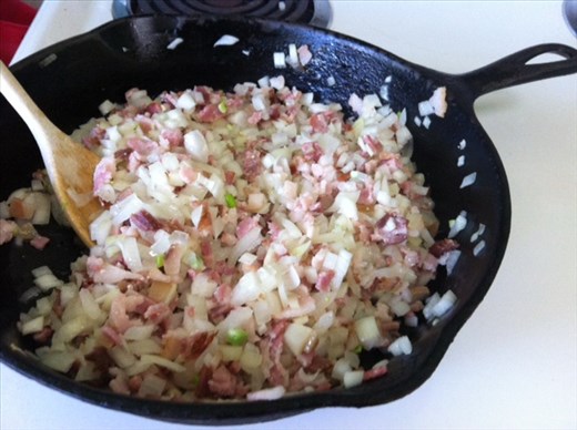 Cooking the bacon and onion!