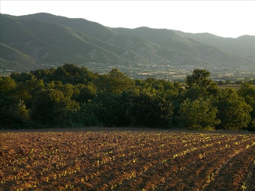 The isolated village of Konce nestled at the foot of the mountains in South Eastern Macedonia. Most of the land in the surrounding areas is used for farming and crops.