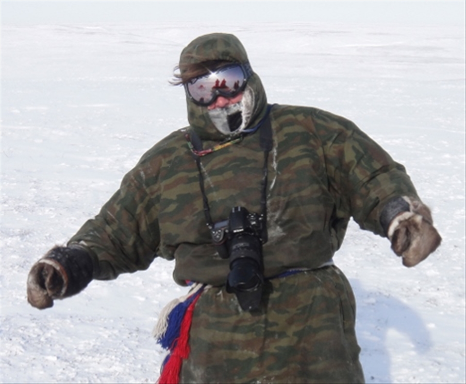 Dressed in the traditional reindeer fur coat 