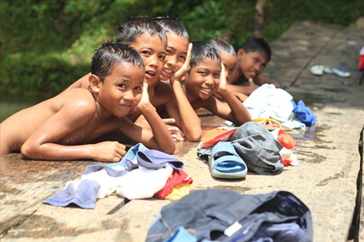 jolly kids with glamorous smile having fun with friends catches my attention