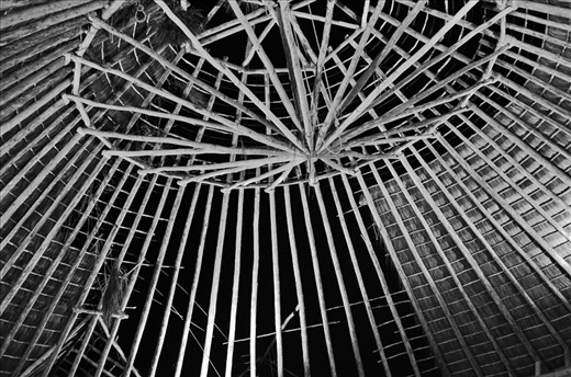 The contractors have to climb and navigate their logs in to design for this roof.   A chainsaw is used to finalize the length of such logs from atop.   A sudden loss of balance tend to yield a lethal result. 