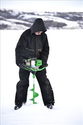 With a gasoline driven ice auger Ron drills several ice fishing holes. : by exploringculture, Views[381]