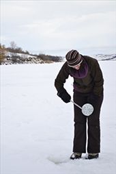 Scooping slush from the hole prevents it from freezing over at - 18 C: by exploringculture, Views[385]
