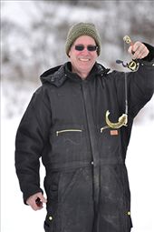 Ron smiles and proudly holds up an immature Walleye writhing in distress. : by exploringculture, Views[386]