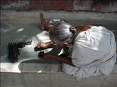Tapasi, aged 69, spends the entire day rolling incense sticks. After 2 days of hard work she will be payed Rs. 10 (approx. 1/5th of a dollar). She tells us she came here 35 years ago because her family believed that even the shadow of a widow falling on any of them was a curse.: by eyespy81, Views[546]