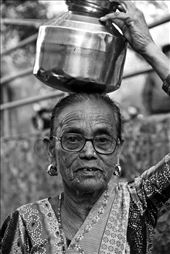 Woman carrying a jug of water home. Seen on Elephanta Island, Mumbai, India.: by fahrinisa, Views[261]
