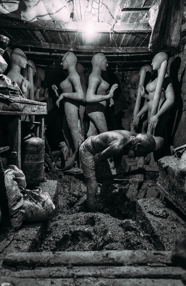 Grapes of Wrath - Kumortuli is an old quarter of Kolkata where families of artists have been working for generations, producing the most beautiful clay deities for the festival of Durga Puja. These deities are born of the Ganges and will be returned to the Ganges. The process begins by gathering clay from the banks of the river, and stomping it into a workable consistency, usually throughout the sweltering summer months.