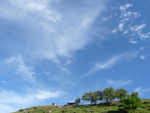 Daily travels of a herder through these lush hills in this sun-drenched high altitude landscape with wind-swept skies makes Lesotho a whimsical paradise for a herder to daydream.