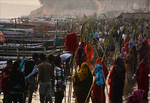 The first day of Chhath Puja, the devotees take a dip,in the river Ganges.