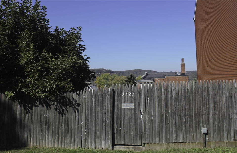 Deep Set: It is hard to explain the quirks of Polish Hill- the tight knit backyards, the sloping roads, or why it's the best kept secret of Pittsburgh. As I walked the streets on a sunny, not very Pittsburgh-like day, I came across a house that I could not see. The surroundings indicated that it should be there in front of me; I peered down the wooden gate to find it resting down the hill. These houseless houses are just as common as the houses stacked on one another, come see for yourself.
