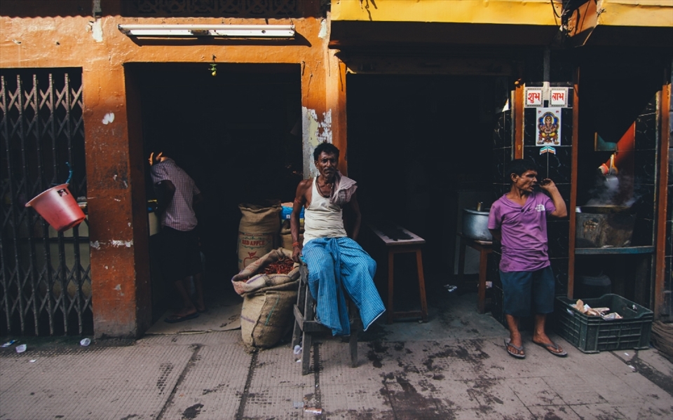 An exhausted wage laborer in Guwahati, Assam waiting for his evening Chai (tea)