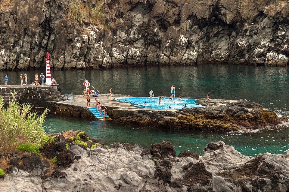 Pool carved in the rocks near the village „Caloura“ -Picture 6451- 

Azoreans enjoy life. They are having siestas, take baths in hot springs or a swimming pool right in the rocks. They keep things real and natural.