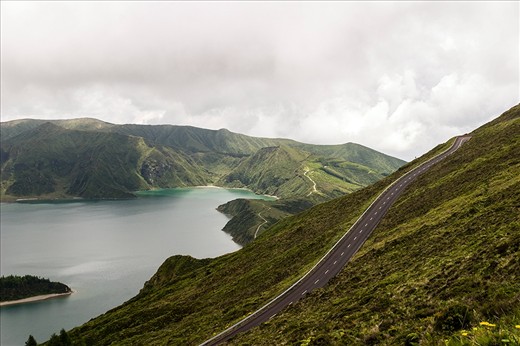 Street around the lake „Lago do Fogo“ -Picture 6184- 

To claim streets in Sao Miguel are narrow and steep is an understatement.You need steady nerves to drive your car around the island being not a local. The good thing is, tell the busdriver where you live, he will deliver you very close.