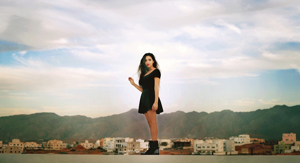 Self portrait standing on top of our rented home in Muscat. Feeling invincible. 