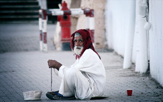 Poverty staring back at me on the streets of Muttrah. 