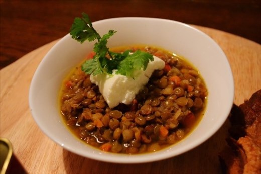 Lentils with smoked pancetta, topped with chicharron & a dollop of sour cream. 