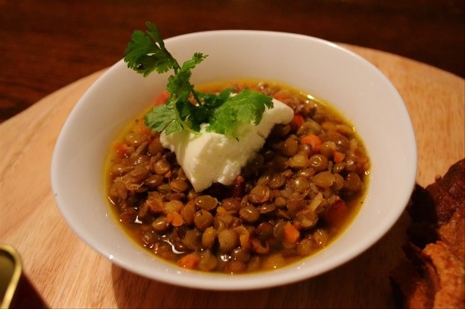 Lentils with smoked pancetta, topped with chicharron & a dollop of sour cream. 