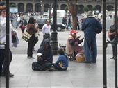 A woman and a child ask for money outside of the main entrance of the Metropolitan Cathedral. Even though Zócalo Square is considered the political, religious and historical center of Mexico, marginalization rates in the surrounding areas are extremely high. This is a place where all kinds of people meet.: by fernandopichardo, Views[655]