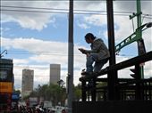 A young man reads a book from the upper part of a sidewalk. The hubbub of Madero Avenue, Latin America's busiest one, doesn't seem to bother him. Finding a place for oneself in a city with a population of more than 8 million can be easier than expected, if a person looks for the right place with some creativity.: by fernandopichardo, Views[420]
