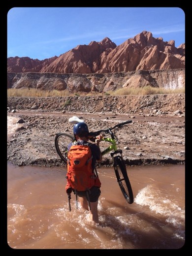 Now that's what I call a real man! Yeah, that's a mountain man! And very gentlemanly to do 3 round trips for the 2 bikes and gear. Btw, the water was damn cold, almost freezing!