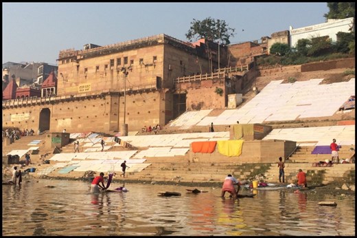 Morning laundry. Btw, the Ganges is horribly dirty (sewage, chemicals, cremations, regular garbage etc). When we have our laundry to our hostel we asked 3 times how they would wash it! ;-)