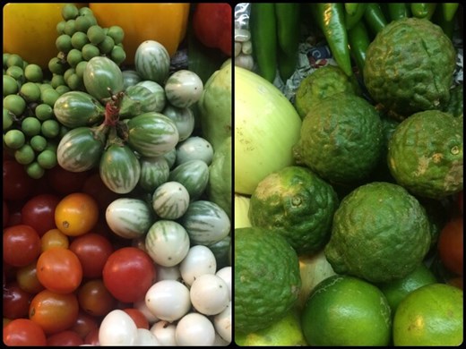 Shopping for vegetables at the local market for our cooking class. On the left, there are tiny eggplants that look like green peas. On the right, kefir limes. 