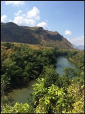Photo of the river Kwai taken from the train on the old Thai-Burma railway. 
The Burma Railway, also known as the Death Railway, the Burma–Siam Railway, the Thailand–Burma Railway and similar names, was a 415-kilometre (258 mi) railway between Ban Pong, Thailand, and Thanbyuzayat, Burma, built by the Empire of Japan in 1943 to support its forces in the Burma campaign of World War II. https://en.m.wikipedia.org/wiki/Burma_Railway: by finally, Views[569]