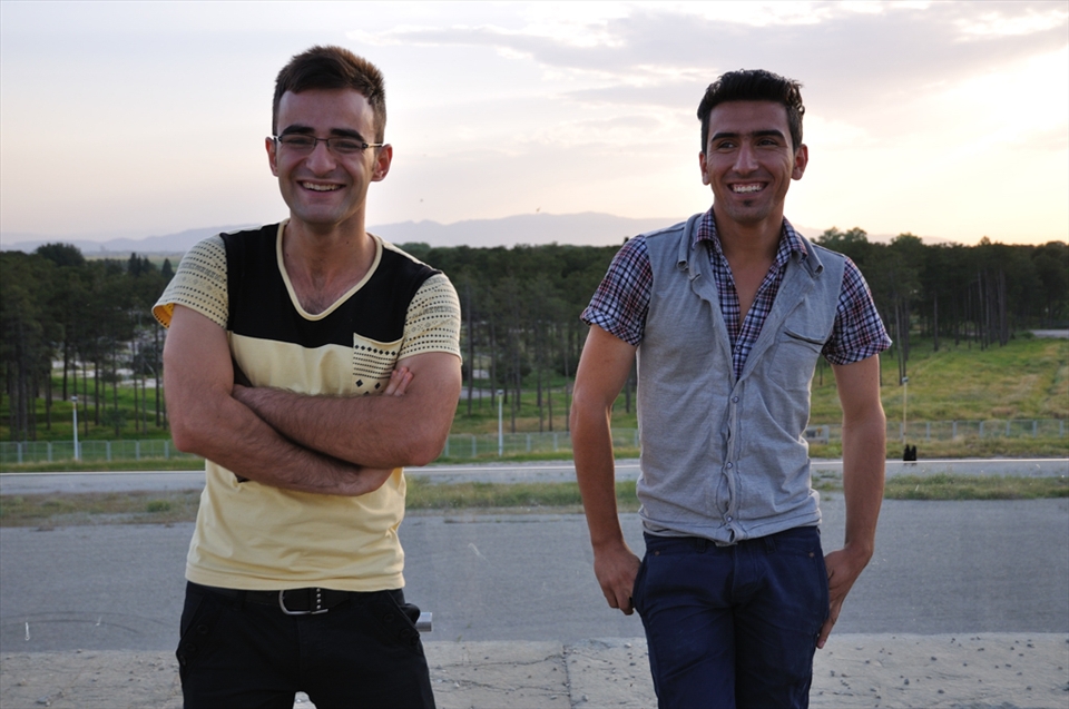 A number of people I meet in Iran are students, studying their first degree or subsequent degree in university. 

I met two of them in Persepolis. While our conversation was limited to basic English, the feeling exchanged was one of warmth, fun and innocence. They suggested a photograph, which I happily obliged. From the LCD screen, I saw their solemn pose. 

‘This is not them,’ I thought to myself. I showed them the photo, told them to smile. Before they could pose again, I clicked my camera. ‘Not ready,’ one of them exclaimed. ‘More natural,’ I responded and showed them the photo. A happy moment immortalized.  
