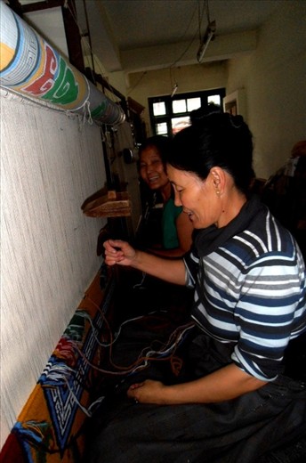 Banging the row down after it's completed.