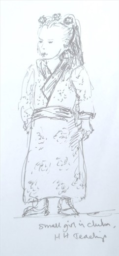 Small girl with flowers in her hair and a gorgeous brocade chuba