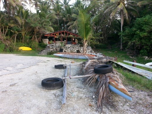 Washaway Cafe at Avatele Beach, with local vaka (canoe). 