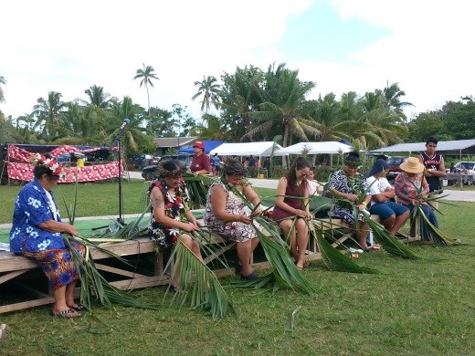 Ladies' speed basket weaving contest at Makefu village fair day.