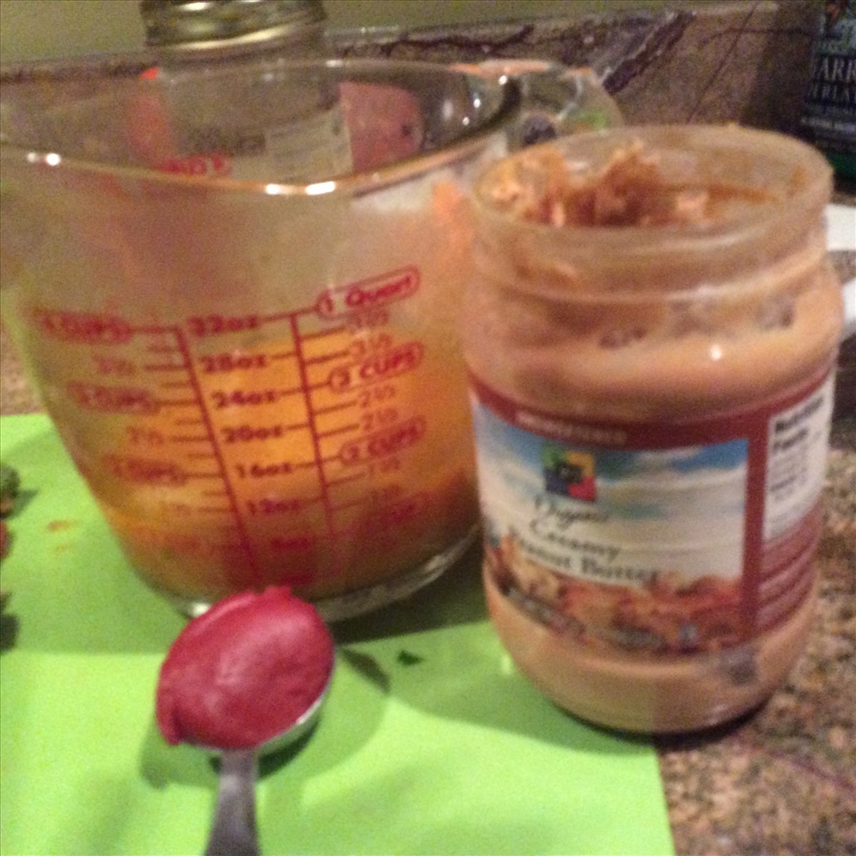 You add the tomato paste and peanut butter to some of the hot broth to make the 'sauce' you add to the broth with the vegetables.