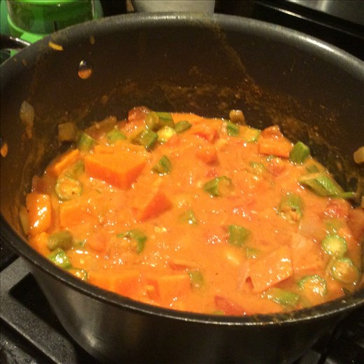 Simmer the stew steadily, so that the flavors of the vegetables, spices and sauce mingle