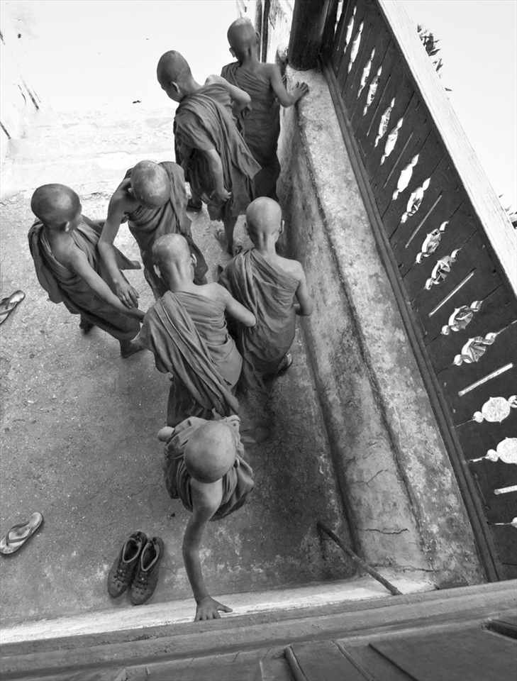 After their chores, novice monks are released to play, Hti Thein Monastery. 