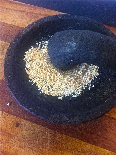 Cooked rice with mortar and pestle