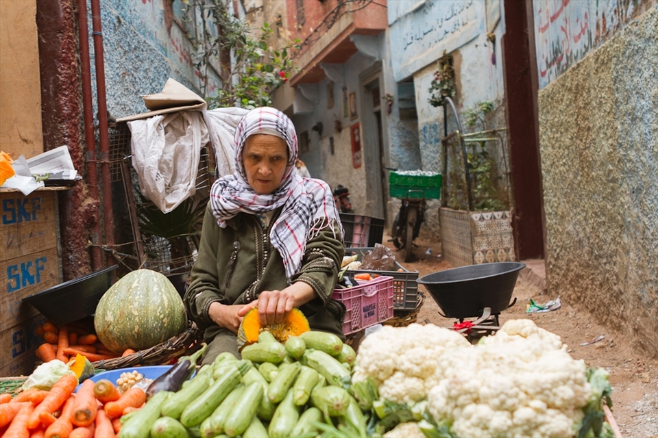 Those photos are taken in the medinas of Morocco. Every big city has its usually old neighbourhood of labyrinths, full of people, animal, food, spices, random goods; they really are more than just a market.
