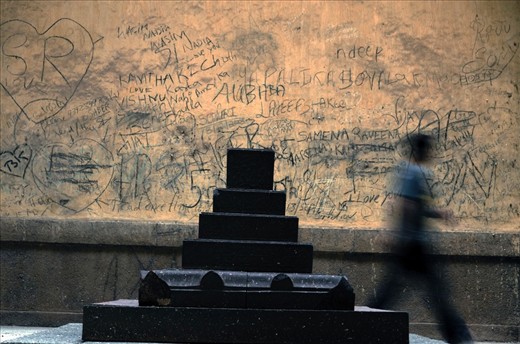People find weird ways to immortalize their love. While one king built one of the seven wonders in the world for his beloved, there are others who engrave their names on someone else's tomb.

I was waiting with my camera in the desired settings and suddenly a man, appeared from nowhere, crossing the frame.