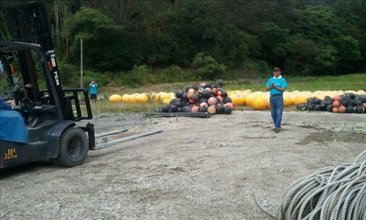 Empty lot with buoys before tents built.