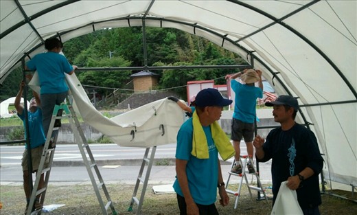 Work on tents by many different teams.