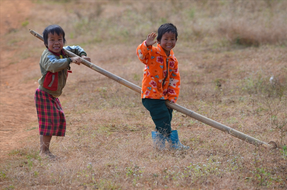 Laughing kids with tools