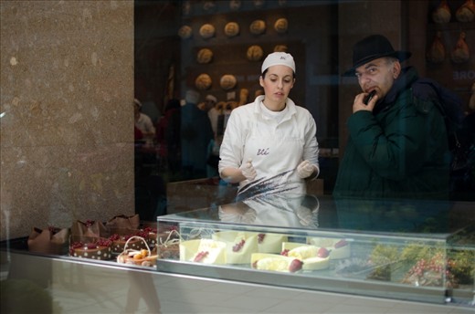 I try to imagine a story if I don't know the person in my photo. In this instance, I like to think that he is secretly buying sweets, maybe his wife doesn't let him eat all the candy he wants. 
