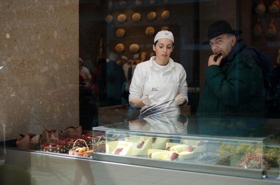 I try to imagine a story if I don't know the person in my photo. In this instance, I like to think that he is secretly buying sweets, maybe his wife doesn't let him eat all the candy he wants. 