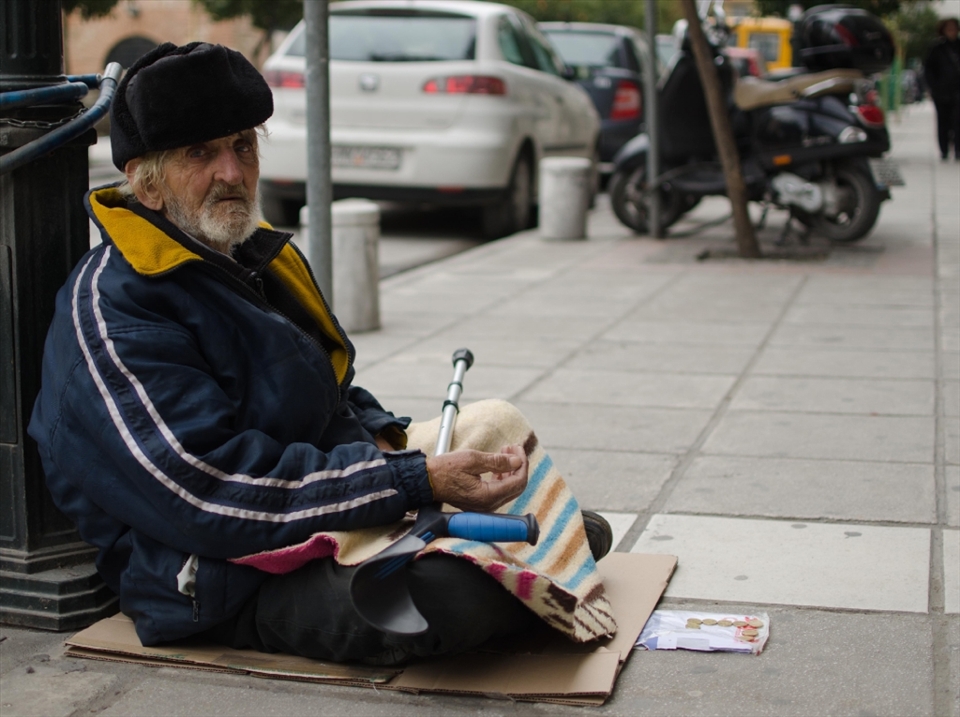 I am usually happy when I can capture a person's look in my photos, but this man made me really sad. It rained later. 