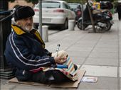 I am usually happy when I can capture a person's look in my photos, but this man made me really sad. It rained later. : by g4rret, Views[509]