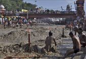 Heights of holiness.....people taking bath in muddy water of ganga: by gangamaa, Views[868]