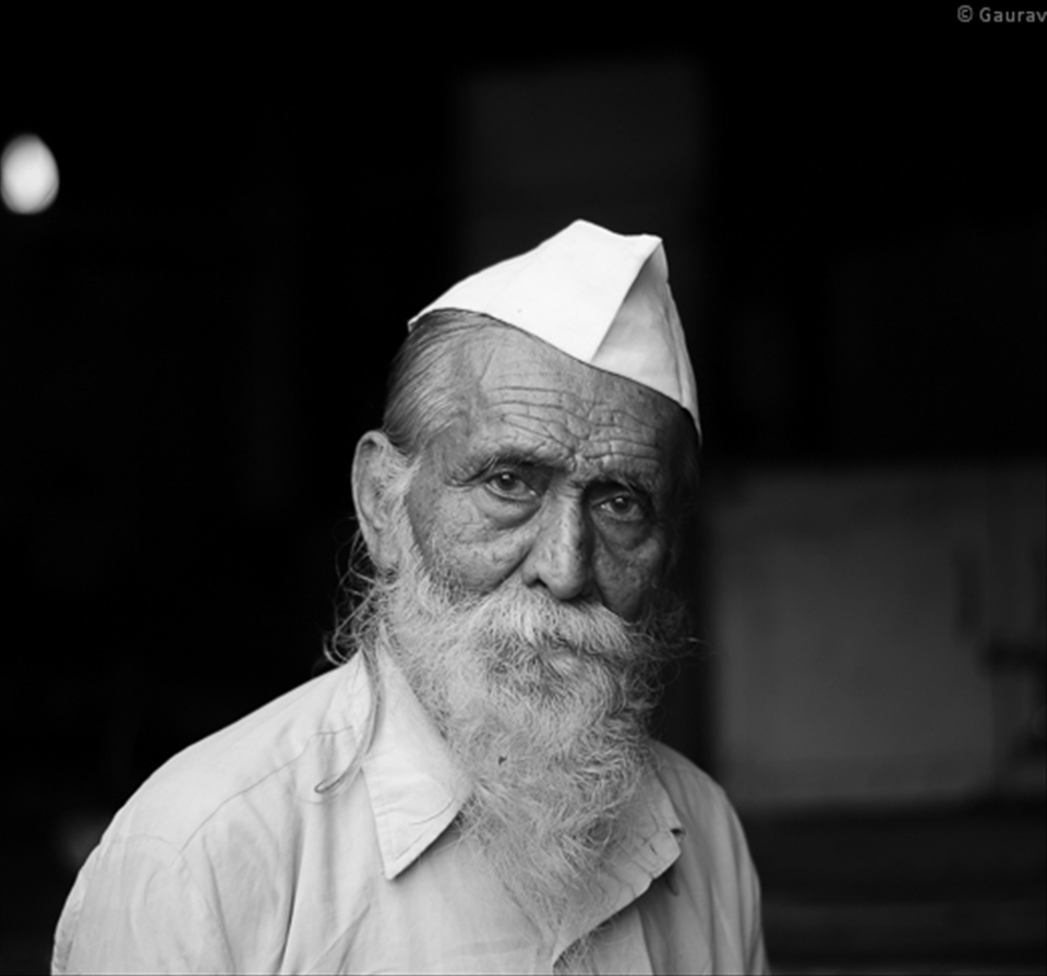 Eyes of experience, wearing his traditional cap for the last 50 years. The last time i visited this market was with my grandfather when i was 6 years old.