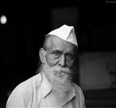 Eyes of experience, wearing his traditional cap for the last 50 years. The last time i visited this market was with my grandfather when i was 6 years old.: by garry, Views[411]